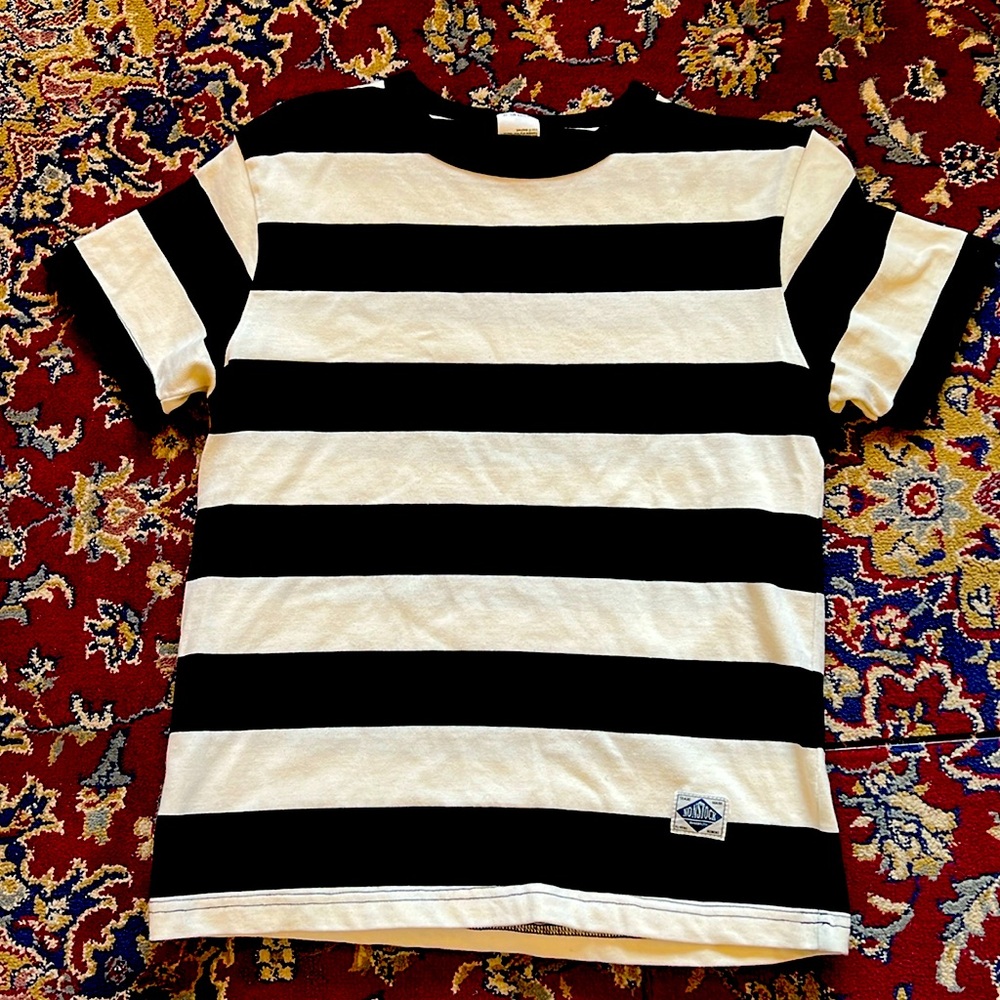 Non stock Black and White striped shirt.